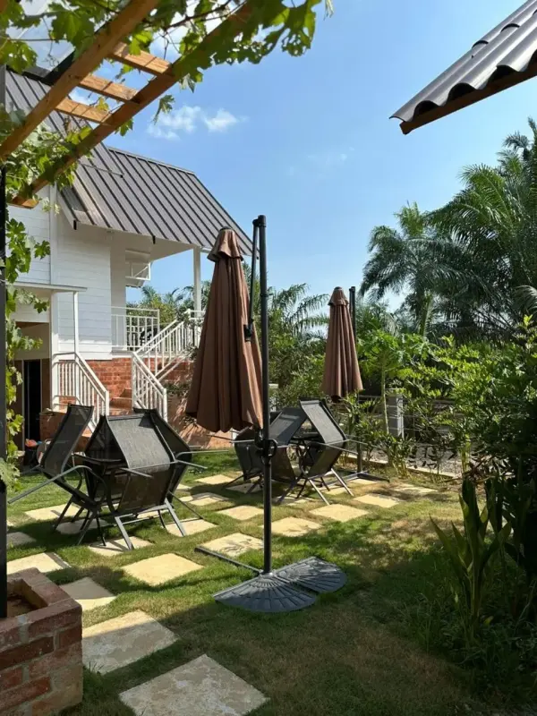 Garden seating area with patio umbrellas