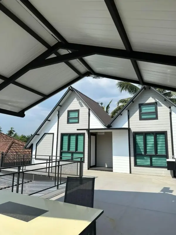 White twin-gabled cottages